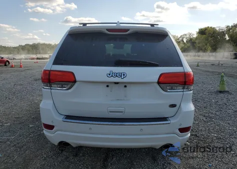 2014 Jeep Grand Cherokee Overland из США, поврежденный, VIN 1C4RJECG8EC211964